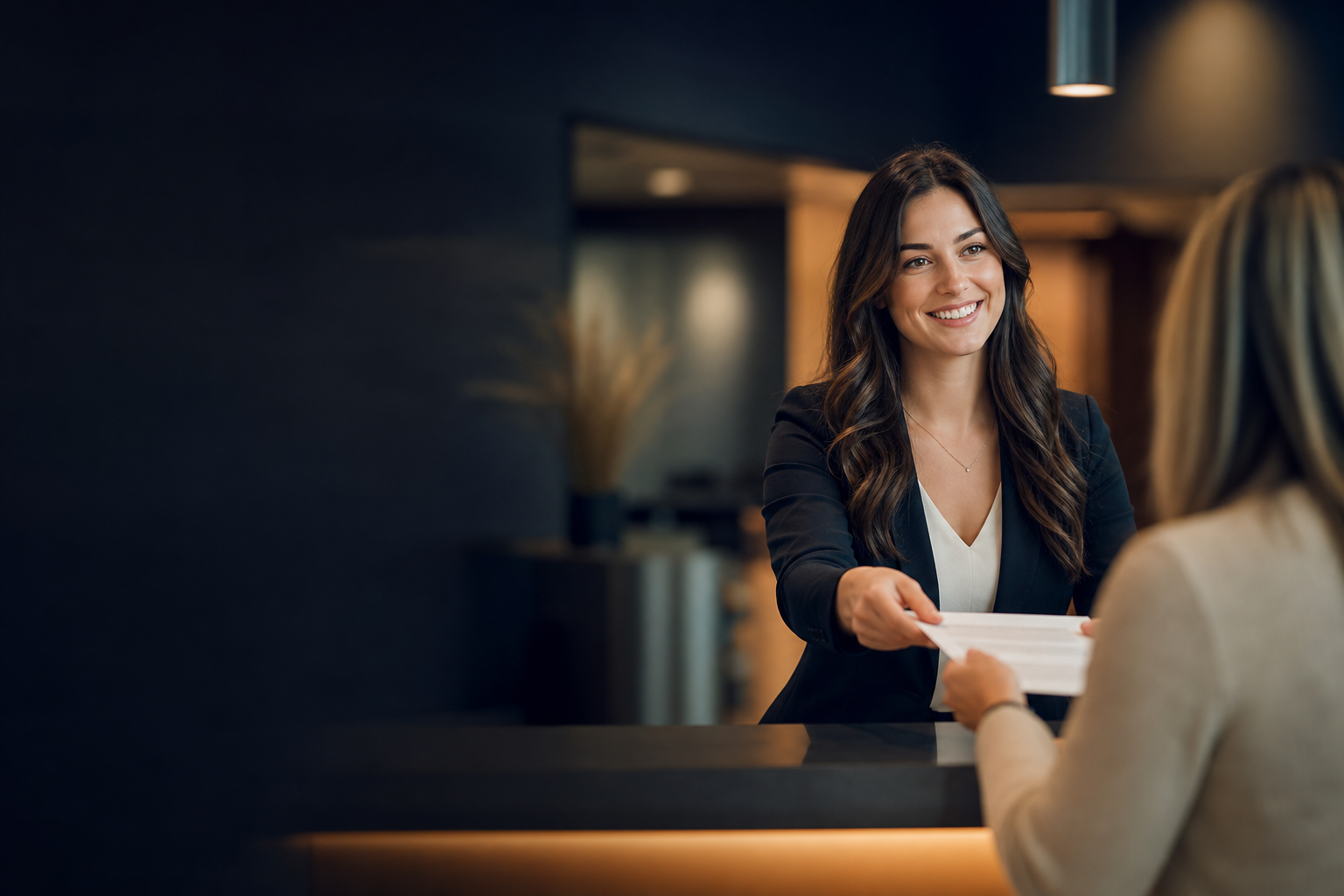 A West-End Registries agent helping a customer at the counter